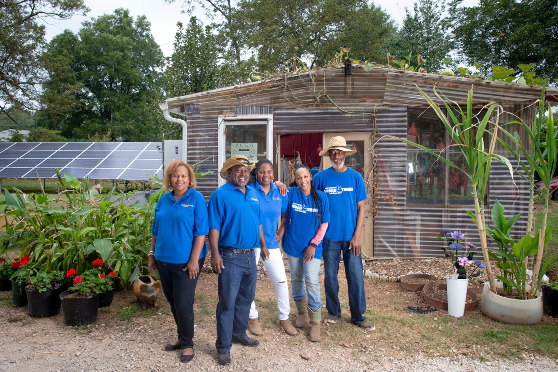 Farm staff and partners working together