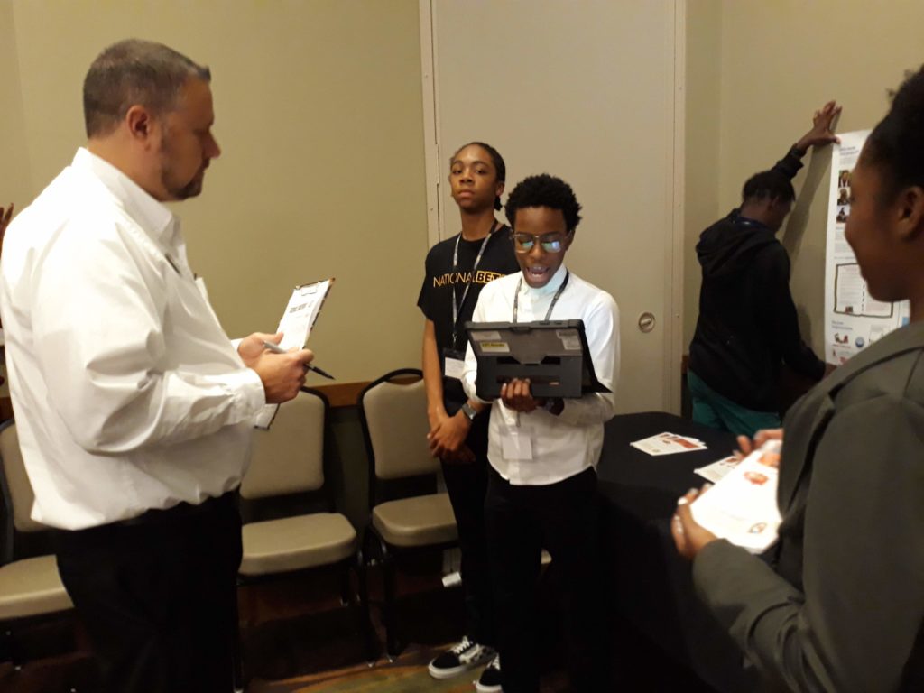 Jaion Henderson and Jennivi Guzman prepare their opening statements.