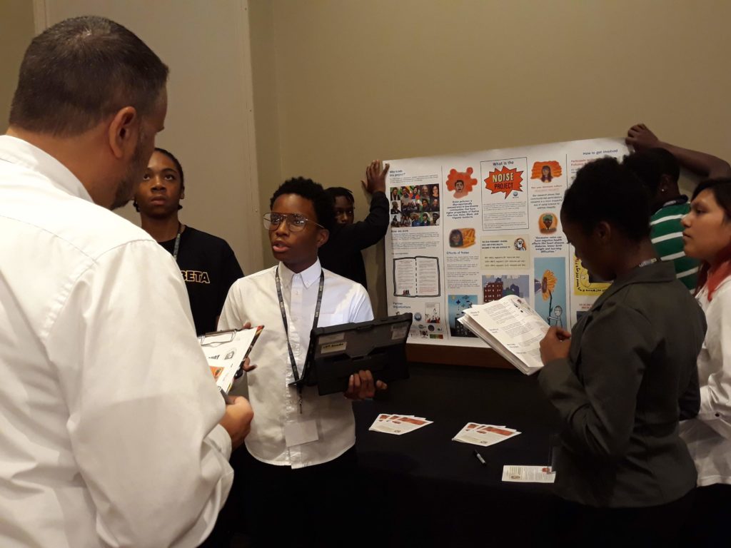 Tri-Cities High School students presenting their noise pollution research